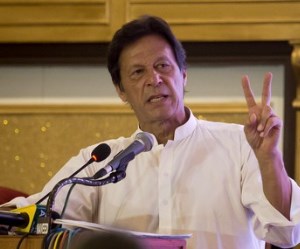 Pakistani opposition politician Imran Khan, chief of Pakistan Tehreek-e-Insaf party, gestures during a press conference to present the party's manifesto for the forthcoming election, in Islamabad, Pakistan, Monday, July 9, 2018. Khan is promising 10 million new jobs, better health and education facilities if he wins the July 25 vote. Titled "Road to New Pakistan," the manifesto is similar to other ambitious past pledges by political parties that ended up unable to make good on them. (AP Photo/Anjum Naveed)