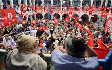 Jewish worshippers attend the annual Jewish pilgrimage to the Ghriba synagogue in Tunisia's southern resort island of Djerba, on May 8, 2023. (Photo by YASSINE MAHJOUB / AFP)