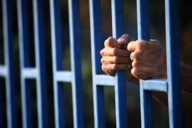 hand in jail.