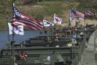 FILE - Flags of South Korea and the United States flutter before a joint river-crossing drill between South Korea and the United States in Yeoju, South Korea on Oct. 19, 2022. North Korea’s Foreign Ministry criticized the United States for expanding joint military exercises with South Korea that it claims are practice for a potential invasion and it warned Tuesday, Nov. 1, 2022 of "more powerful follow-up measures" in response. (AP Photo/Lee Jin-man, File)