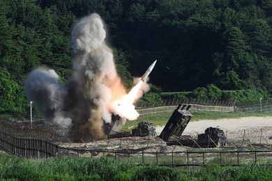 EAST COAST, SOUTH KOREA - JULY 05: In this handout photo released by the South Korean Defense Ministry, U.S. M270 Multiple Launch Rocket System firing an MGM-140 Army Tactical Missile during a U.S. and South Korea joint missile drill aimed to counter North Korea's intercontinental ballistic missile test on July 5, 2017 in East Coast, South Korea. The U.S. Army and South Korean military responded to North Korea's missile launch with a combined ballistic missile exercise on Wednesday, into South Korean waters along the country's eastern coastline. (Photo by South Korean Defense Ministry via Getty Images)
